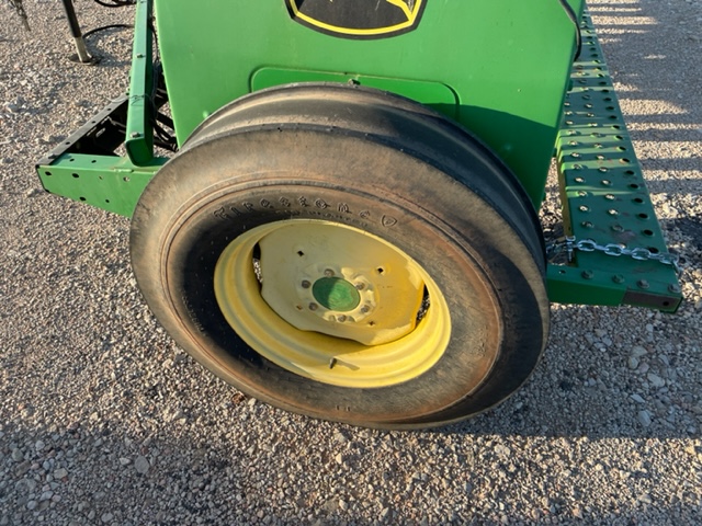A Tractor Parked In The Dirt