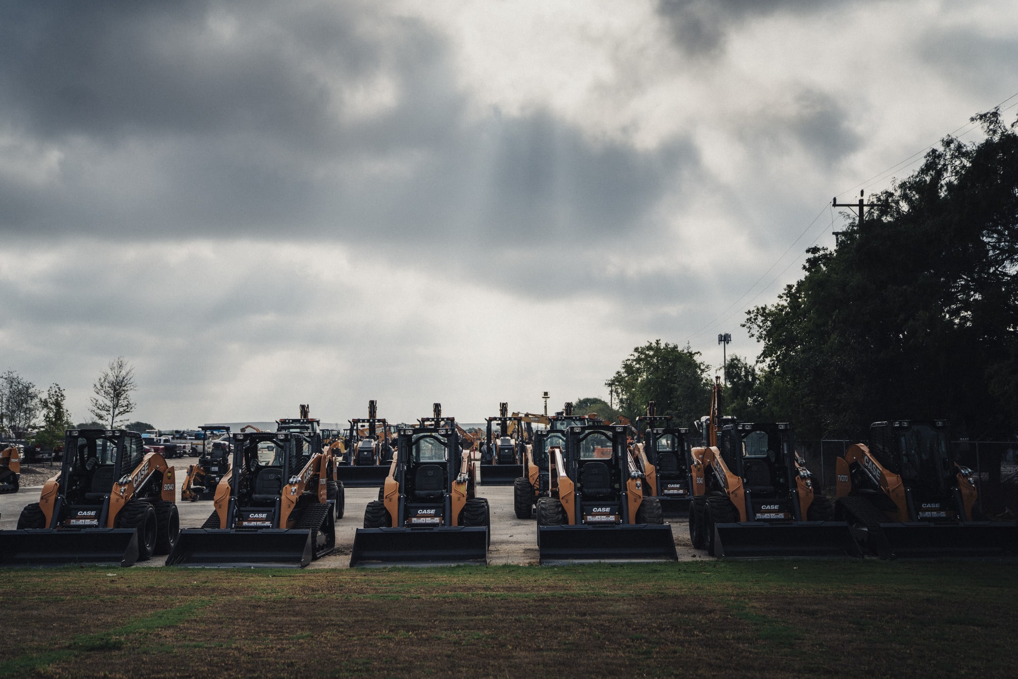 A lineup of brand new CASE machines for sale at ASCO’s heavy equipment dealership in Texas.